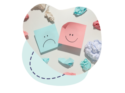 Post'it avec un visage souriant à côté d'un post'it avec un visage triste